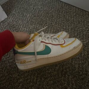 Nike women’s' White and Teal Air Sneakers